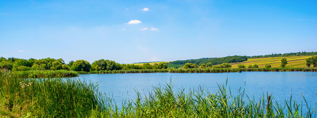 Photo of nature around beautiful blue lake
