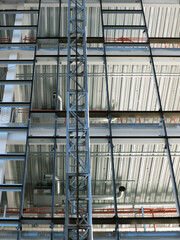 construction site with lift and ladders