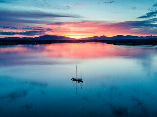 Aerial of an amazing sunset with sailing vessel Loch Creran, Barcaldine, Argyll © Lukassek