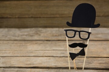 Anthropomorphic face on wooden table