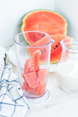 Watermelon smoothie. Preparation of smoothies. Summer cocktail.