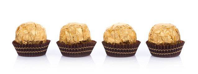 Chocolate balls on white background