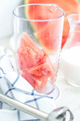 Watermelon smoothie. Preparation of smoothies. Summer cocktail.