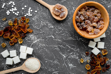 lumps and sanding sugar for sweets on kitchen table background top view mock up