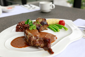 BBQ Steak. Barbecue Grilled Beef Steak Meat with Vegetables