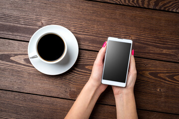 Woman holding smart phone