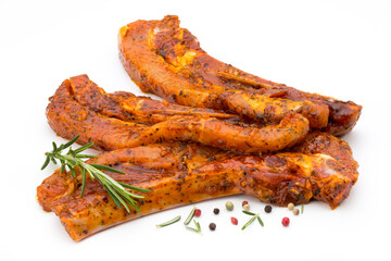 Spicy marinated spare ribs barbecued on the white background.