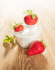 bowl with sour cream and strawberries