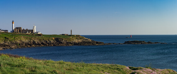 Fototapeta na wymiar Abbey ruin and lighthouse, Pointe de Saint-Mathieu, Brittany, France