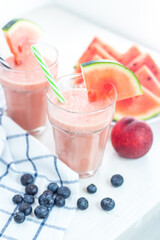 Watermelon milk smoothies. Summer cocktail. Summer drink. Watermelon. Milk. Blueberry. Peach. Fruit.