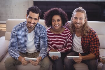 Portrait of smiling young creative business people 