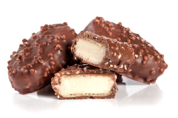 chocolate candy with white cream filling isolated on white background