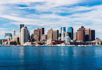 Fototapeta na wymiar Panoramic view of Boston skyline, view from harbor, skyscrapers in downtown Boston, cityscape of the Massachusetts capital, USA