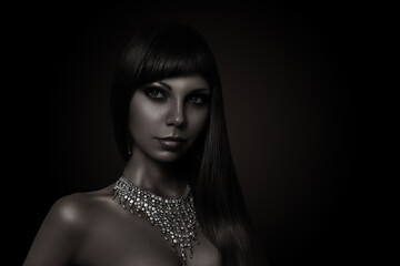 Fashion portrait of beautiful woman with necklace