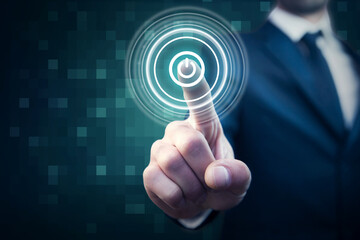 Businessman on blurred background holding render power button with his hand