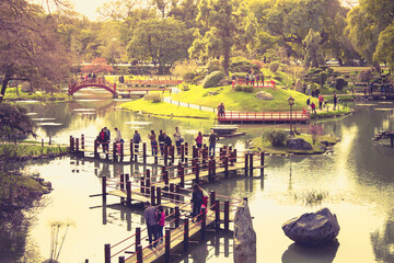 Buenos Aires, Argentina - Tourists walking on the pier of the Japanese garden.