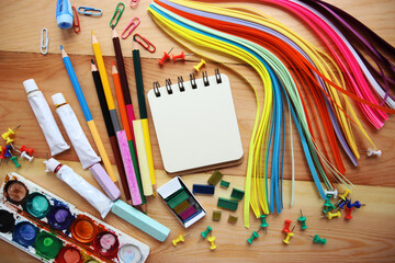 Stationery on a wooden background