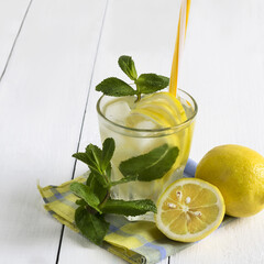 Detox water with lemon and fresh mint leaves. Healthy lifestyle
