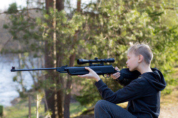 teenager with air gun