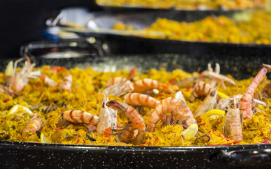 Seafood paella sold at street market stand