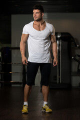Portrait of Muscle Man in White T-shirt