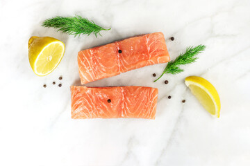 Photo of slices of salmon on white with copyspace