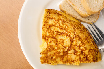 Slice of Spanish tortilla, potato omelette, served as tapas