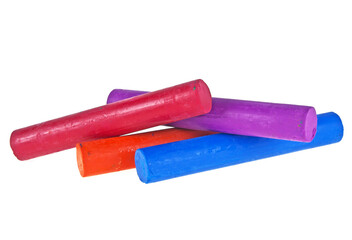 Close up of multicolor chalk on a white background