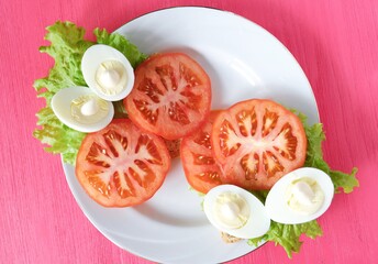 Vegetable sandwich with egg on wooden background 