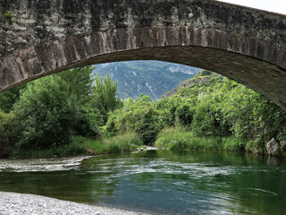 Landscape view under an old bridge