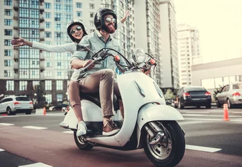 Foto op Plexiglas Couple on scooter © georgerudy