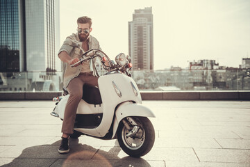 Guy on scooter © georgerudy