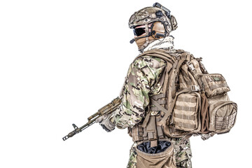 Operator of Russian special operations forces with kalashnikov assault rifle, military backpack and...