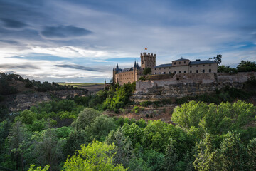 Fototapeta na wymiar Alcazar in Segovia on hill top overlloking valley