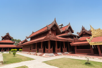 Old ornate buildings at the royal Mandalay Palace in Mandalay, Myanmar (Burma).