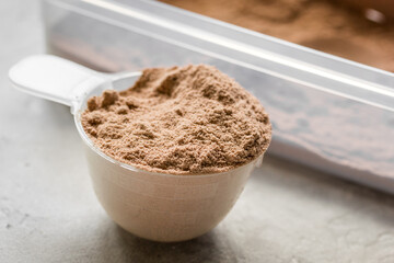 protein powder for fitness nutrition to start training stone background