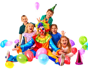 Birthday child clown playing with children. Kid holiday cakes celebratory in hands of events organizer man. Fun of group people lying floor on white background. Happy childhood.