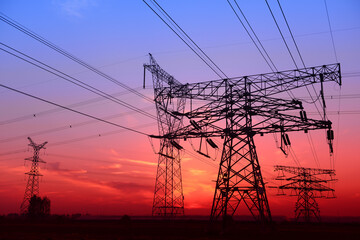 Fototapeta premium High voltage towers in the evening