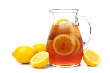 Pitcher of iced tea with lemons isolated on a white background