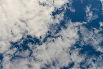 Blue sky with clouds background in beautiful summer day.