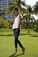 Fashionable woman posing in denim at South Point Park