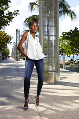 Fashionable woman posing in denim at South Point Park