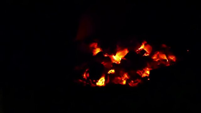 charcoal glowing in dark pizza oven slowmotion HD