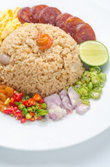 Rice Seasoned with Shrimp Paste, Thai food, Thai cuisine on white dish over white table.