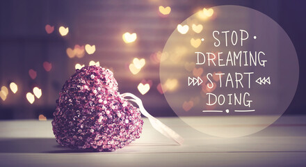 Stop Dreaming Start Doing message with a pink heart