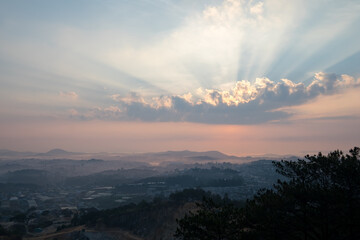 Morning mist at Da Lat, Lam Dong, Viet nam. Mountains during sunrise. Beautiful natural landscape in the summer time 