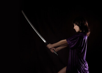 beautiful sexy woman with samurai sword. sexy woman with katana