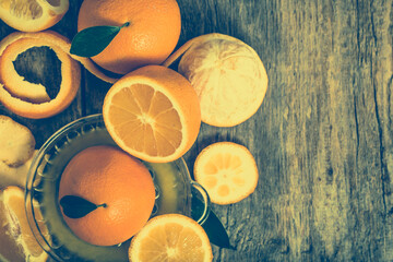 Fresh orange juice squeezing and oranges fruits, overhead