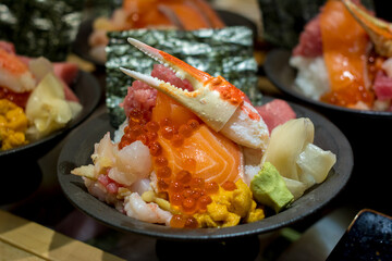 seafood don set. A lot seafood sashimi luxury raw food Japanese style on rice.