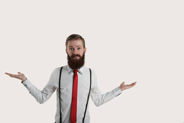 Fototapeta premium Problems of choice of stylish student or young businessman. indecisive man and lost chooses the right path. Young attractive hipster guy search the way in the study.